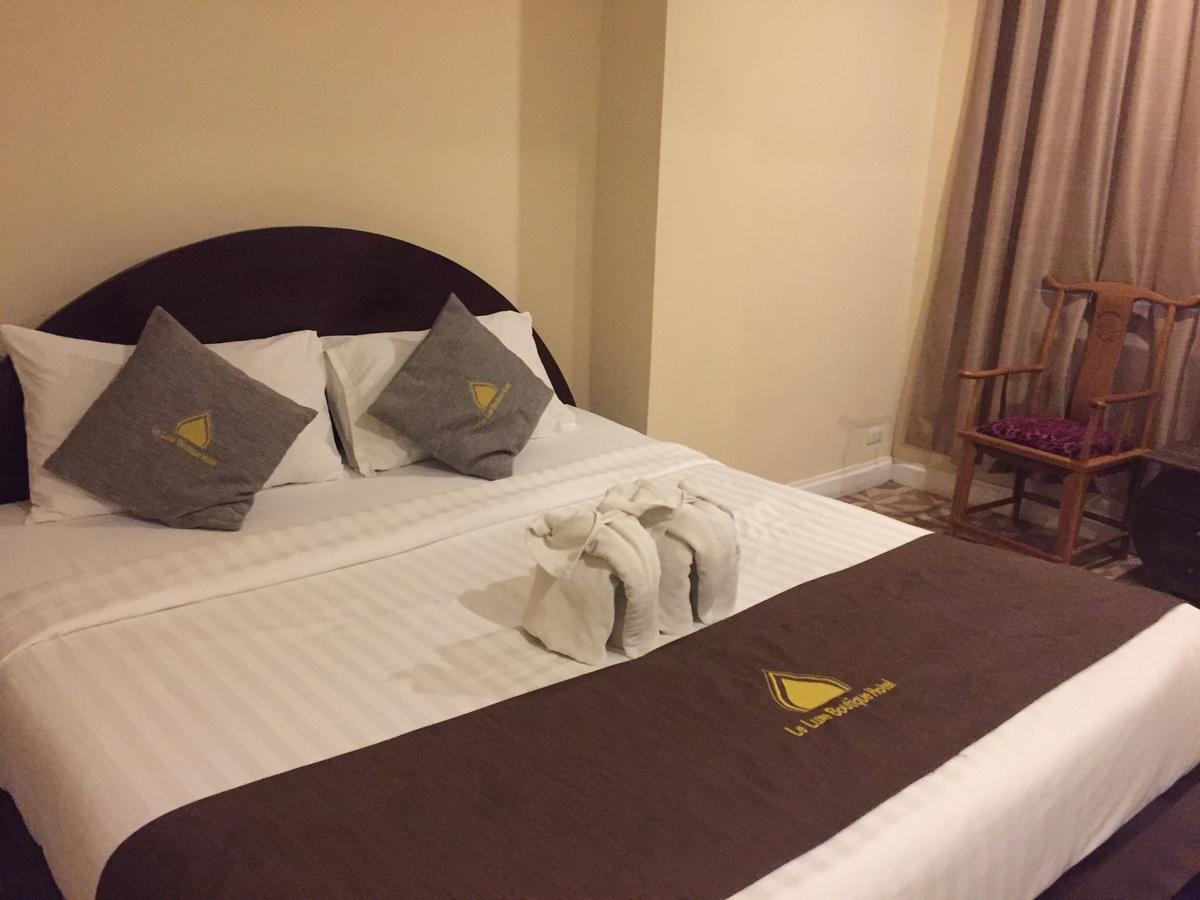 Le Luxe Boutique Hotel Вьентьян Экстерьер фото